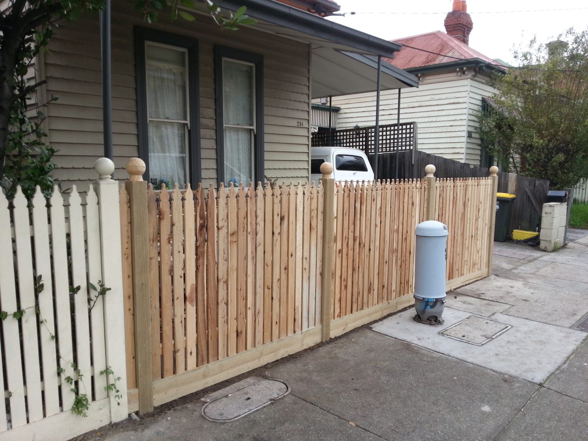 New timber paling installed on front fence in Melbourne. 